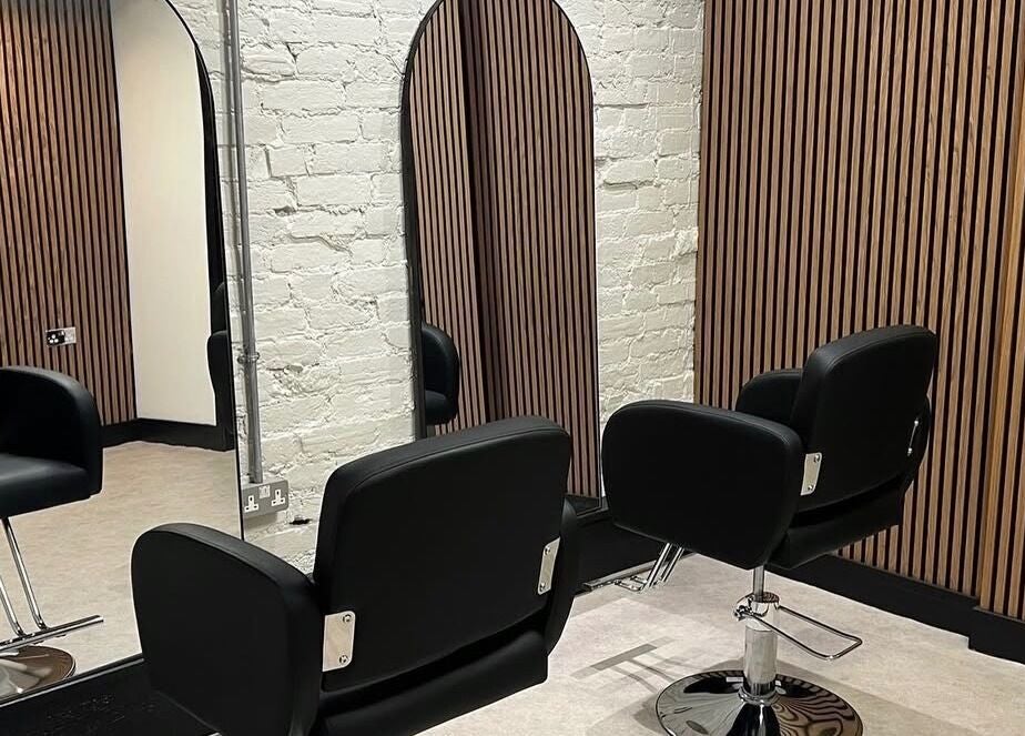 Elegant salon chairs and mirrors at Alder Hills- Essence of Beauty, Poole, England, GB.