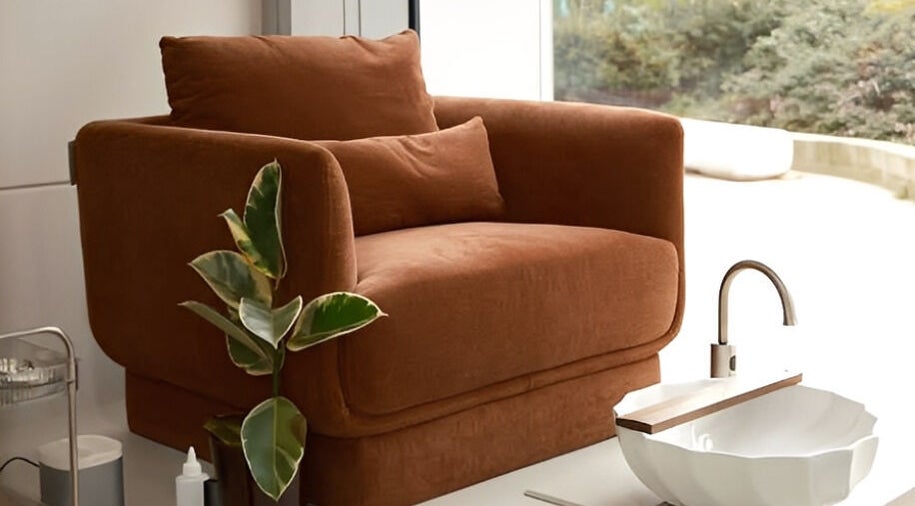 Cozy brown chair and modern basin at XYZ Beauty Lab, London, England, GB, offering a tranquil relaxation spot.