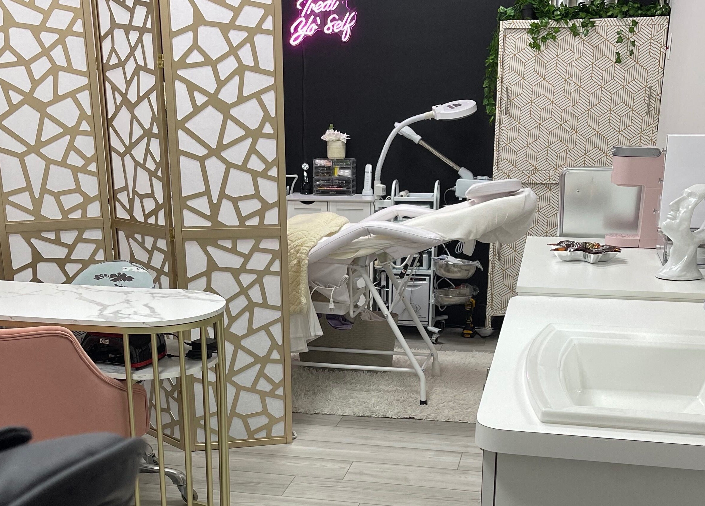 Luxurious treatment room at Alta Beauty in Winter Garden, Florida, US with modern decor and massage bed.