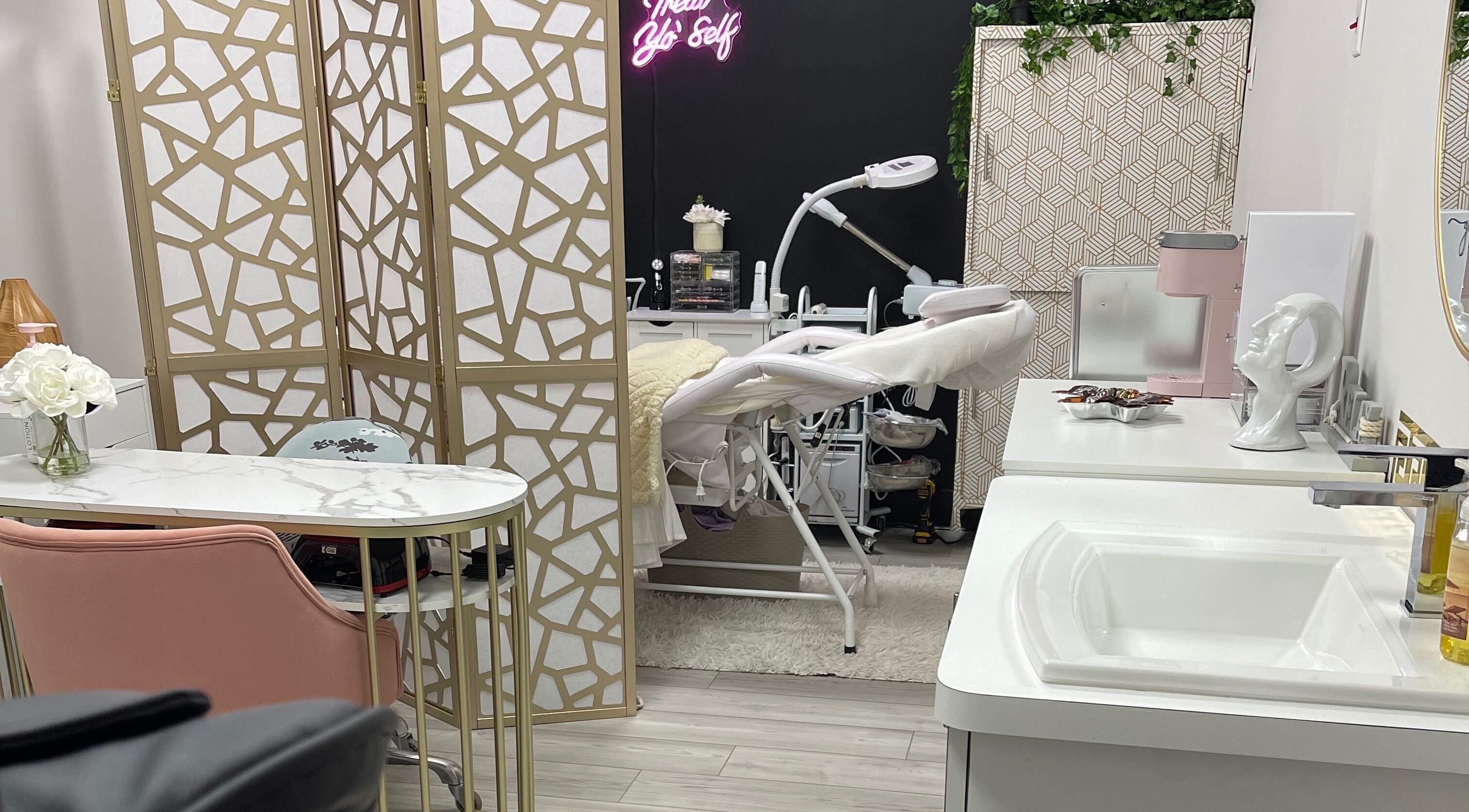 Luxurious treatment room at Alta Beauty in Winter Garden, Florida, US with modern decor and massage bed.