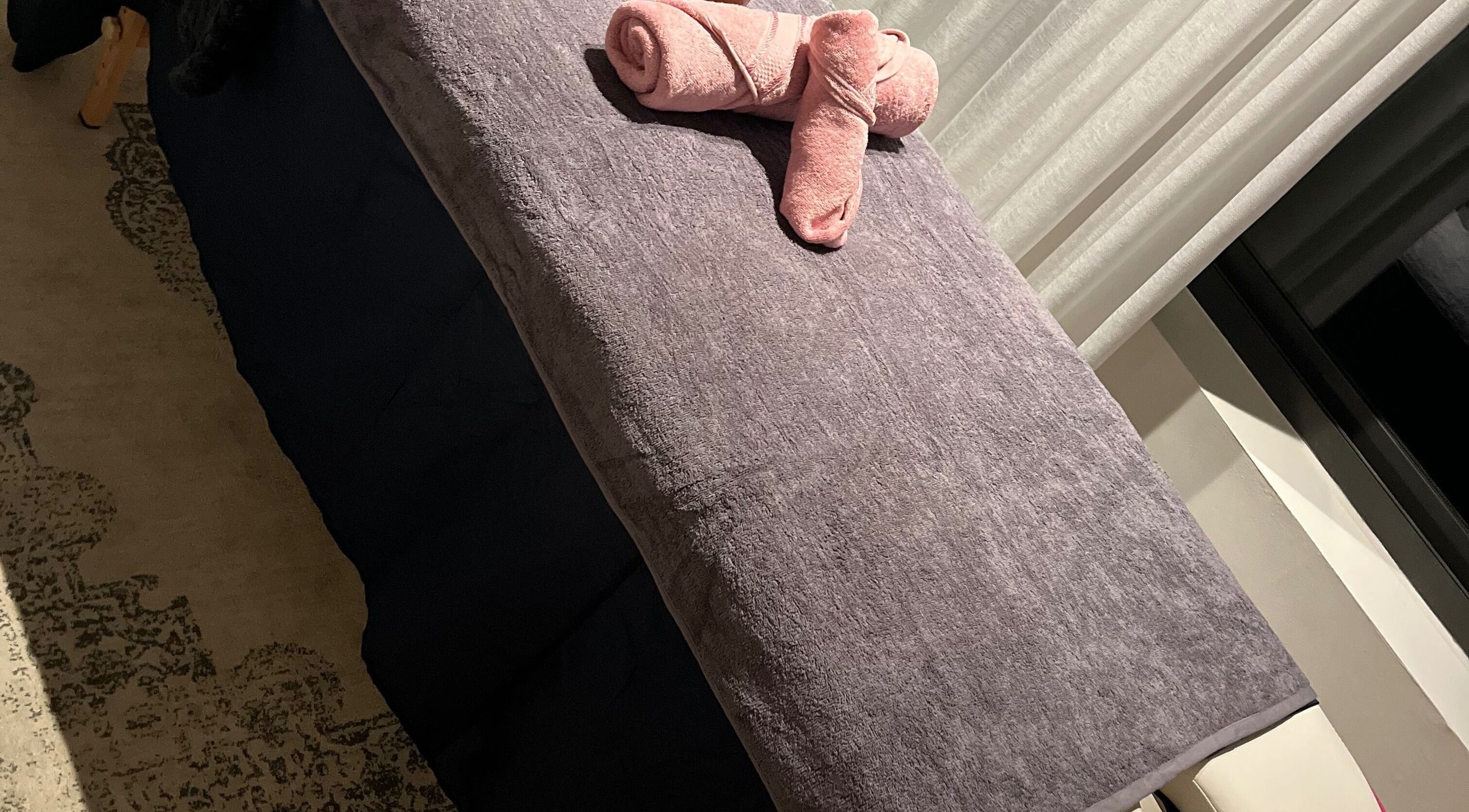 Massage table at Relaxation Realm Mobile Massage, Cape Town, Western Cape, ZA, prepared with soft towels.