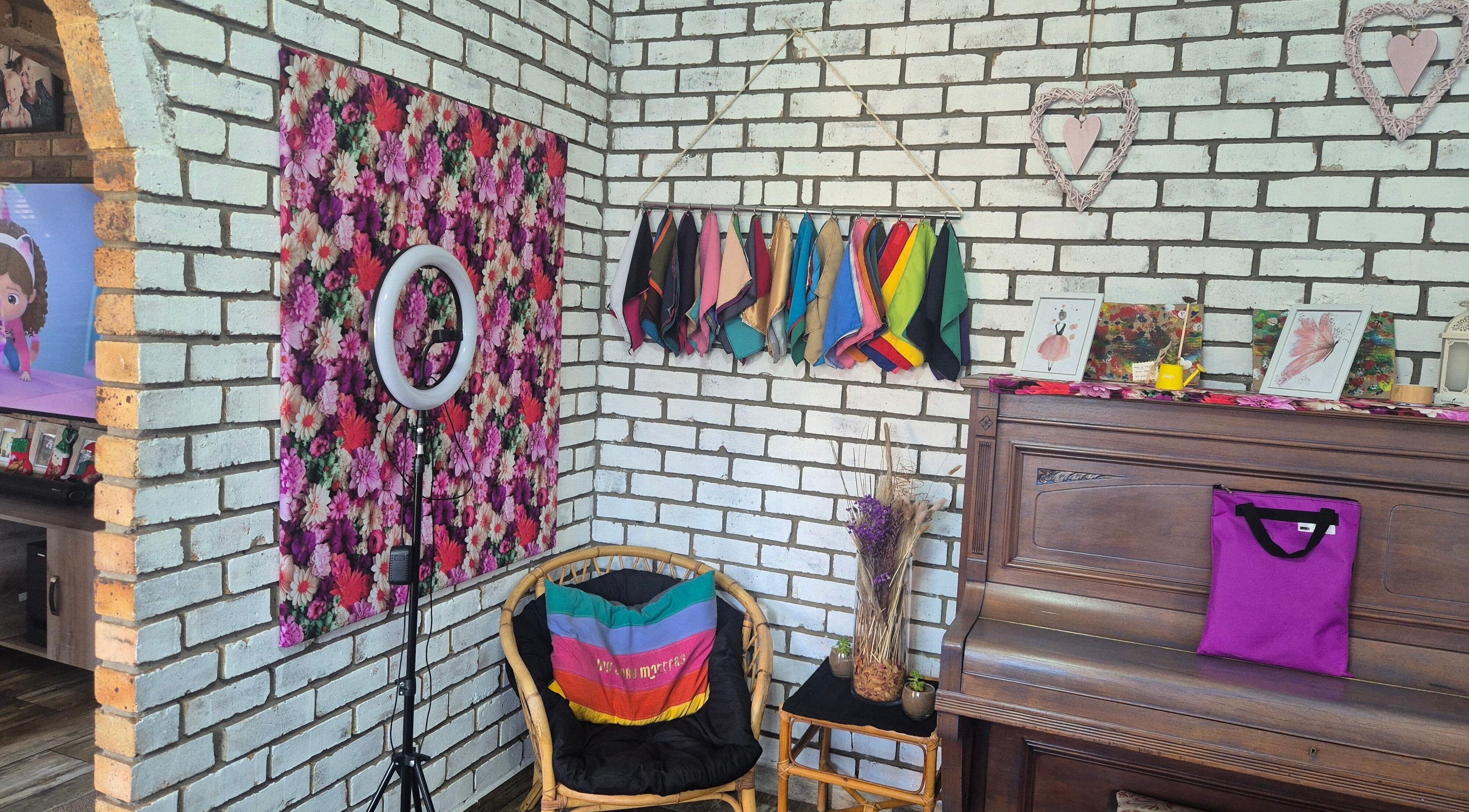 Cozy corner at The Masterpiece Consulting, Krugersdorp, Gauteng, ZA with vibrant decor and floral accents.