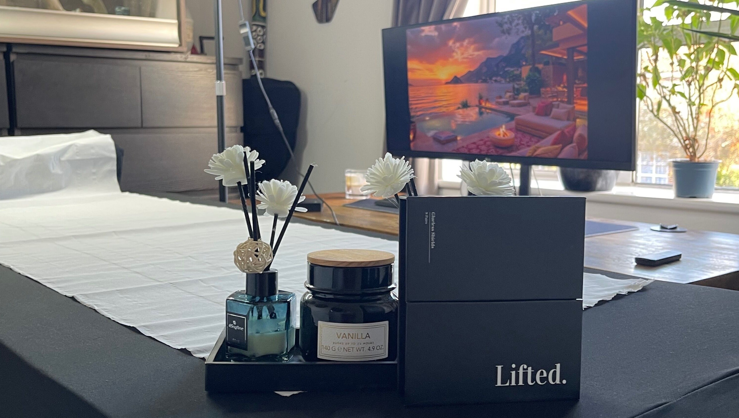 Elegant table setup with scented candles at Lash Lift & Brows London, London, England, GB.