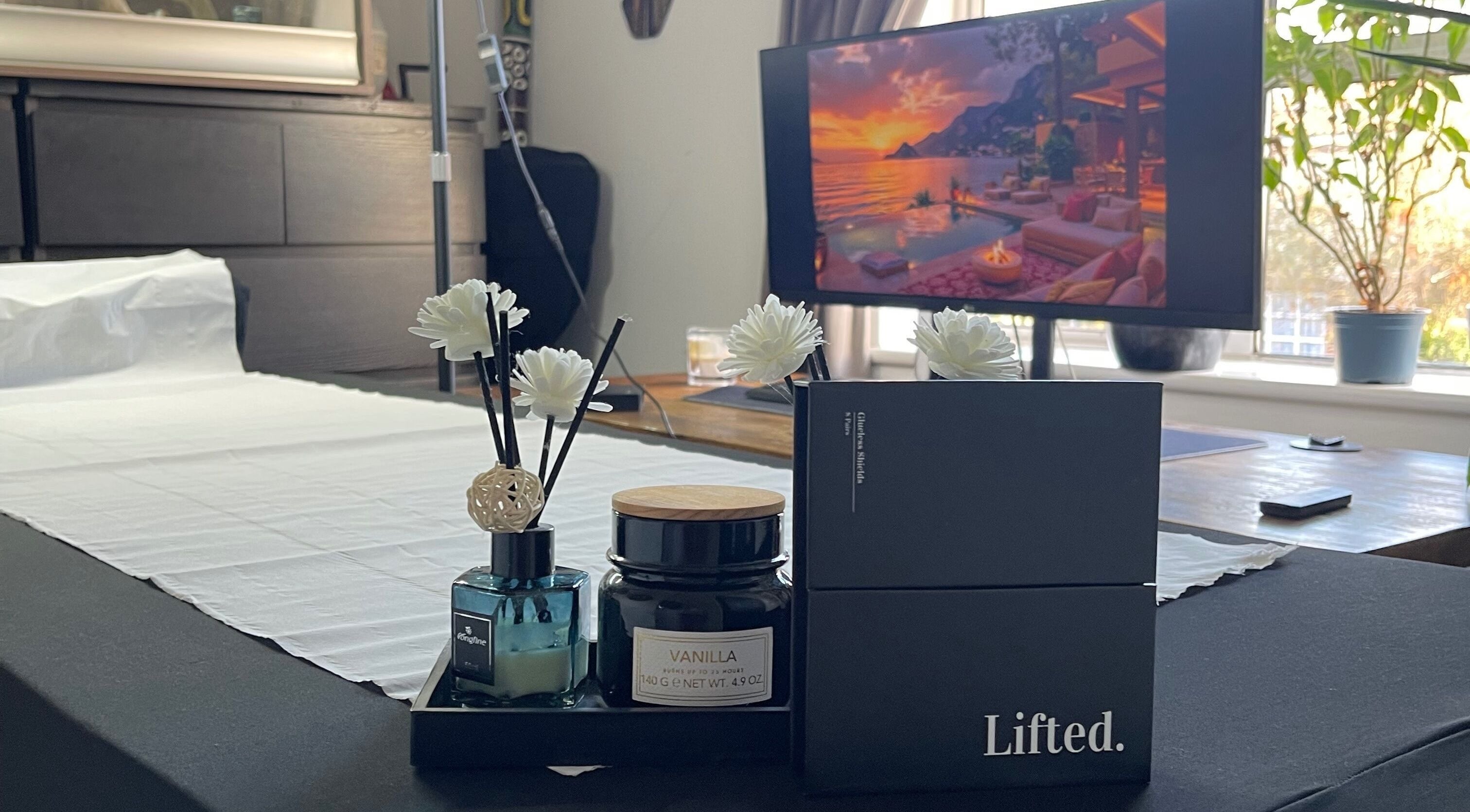 Elegant table setup with scented candles at Lash Lift & Brows London, London, England, GB.