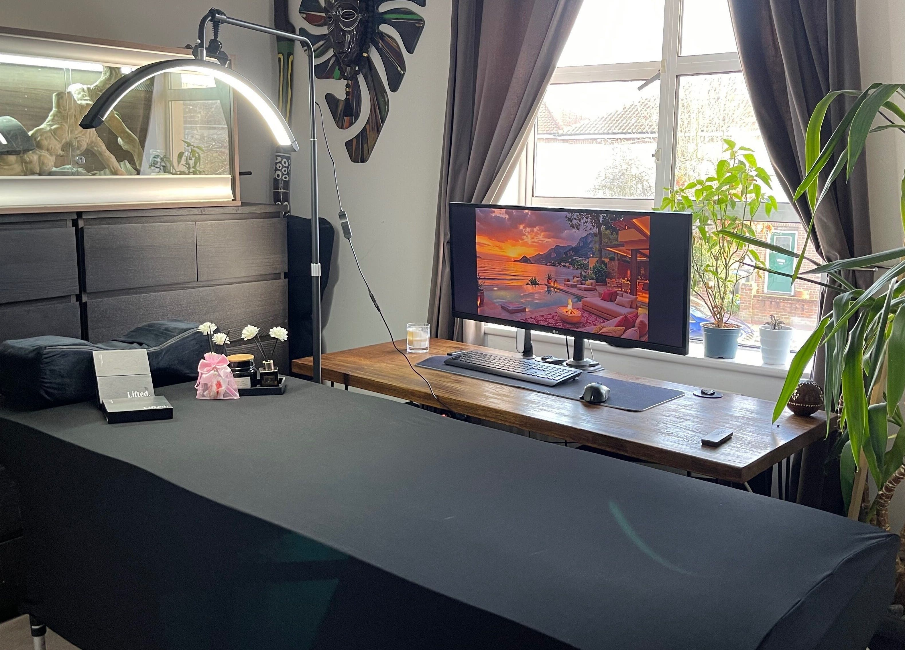 Calm beauty room at Lash Lift & Brows London, London, England, GB with massage bed, decor and window view.