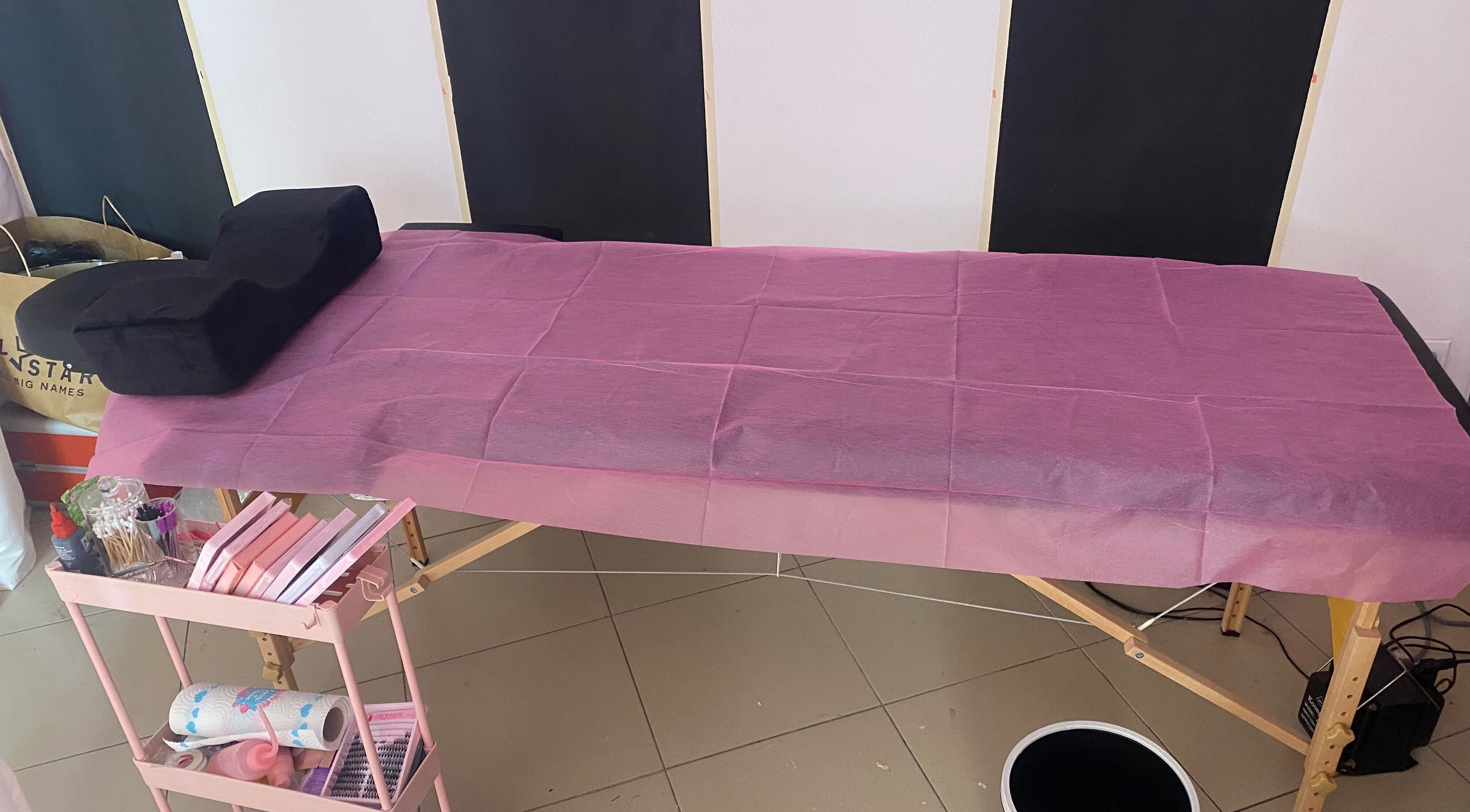 Relaxing spa bed setup at DaintyLadies BeautySpot, Paramaribo, Paramaribo, SR for ultimate pampering.