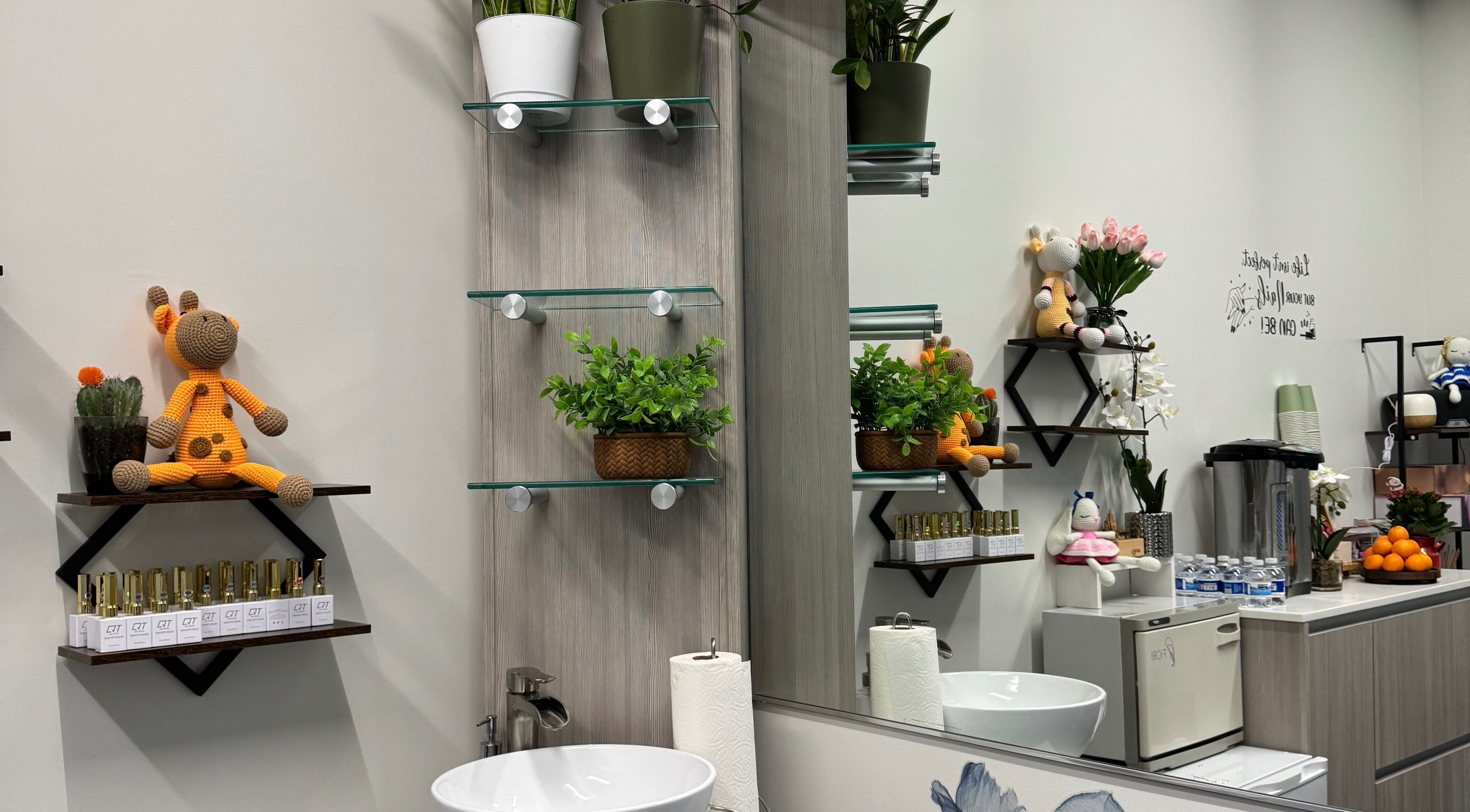 Ivy's Nails in Santa Clara, California, US, showcasing elegant decor with plants and plush toys.