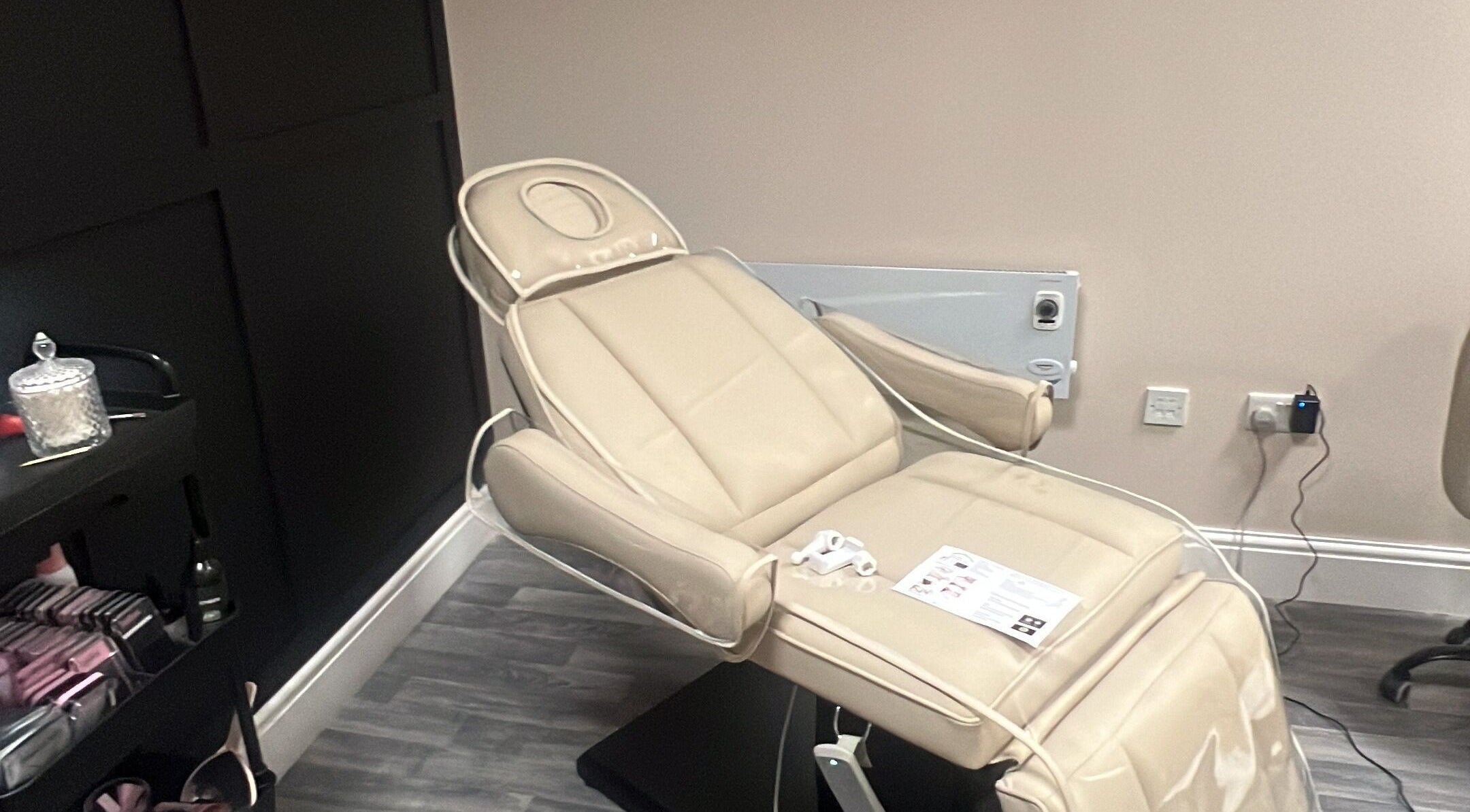 Elegant treatment chair at Angel-Noir Aesthetics, Stockport, England, GB, offering comfort and style for beauty services.