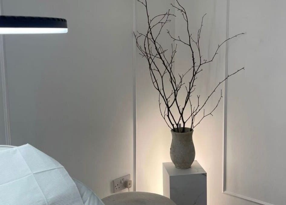 Minimalist decor at TheBrowBabesx, Talke, England, GB, showcasing chic vase with branches.