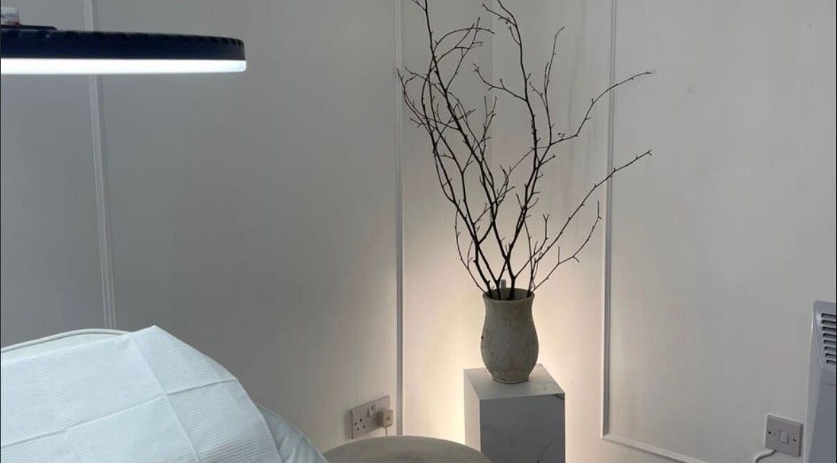 Minimalist decor at TheBrowBabesx, Talke, England, GB, showcasing chic vase with branches.