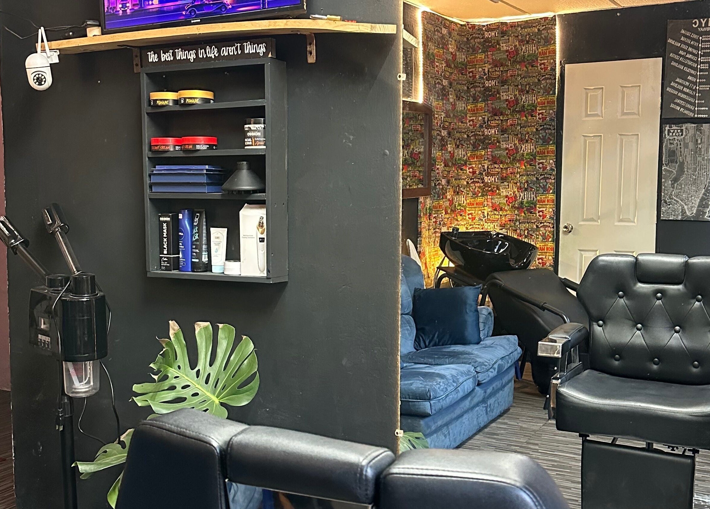 Interior of Diego Barber Studio, San Pedro Las Huertas, with stylish chairs and decor.