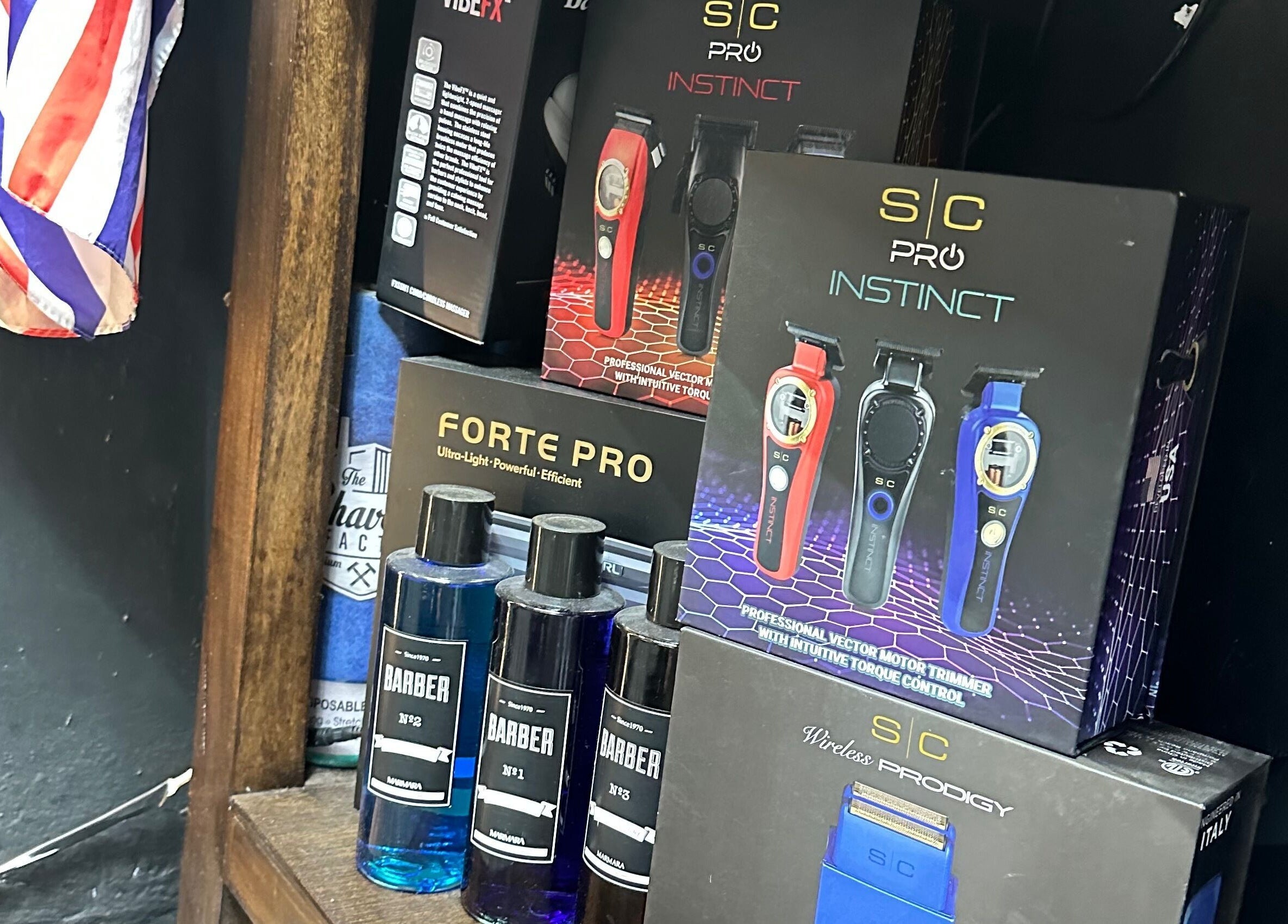 Diego Barber Studio product display, San Pedro Las Huertas, Sacatepéquez, GT showing clippers and grooming products.