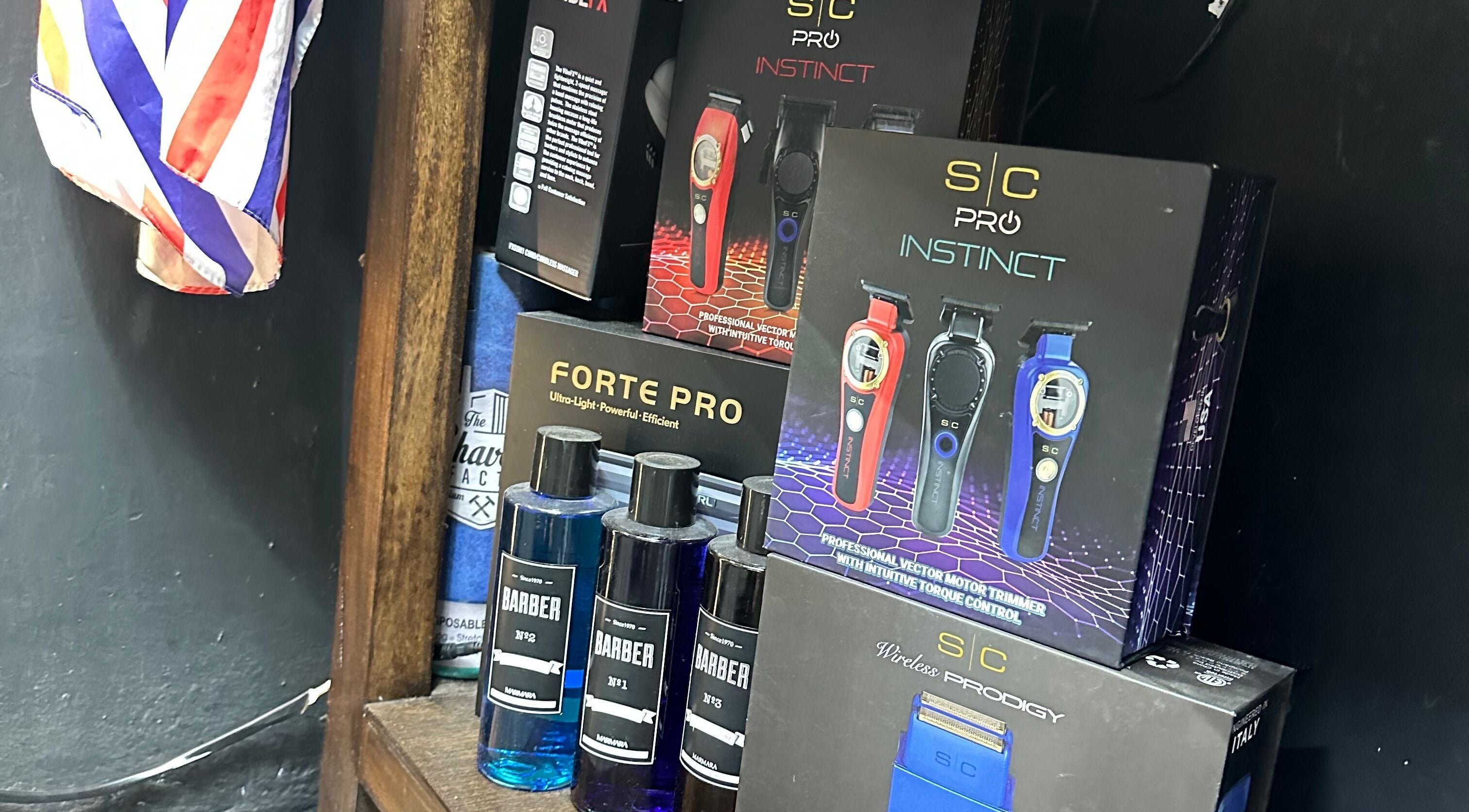 Diego Barber Studio product display, San Pedro Las Huertas, Sacatepéquez, GT showing clippers and grooming products.