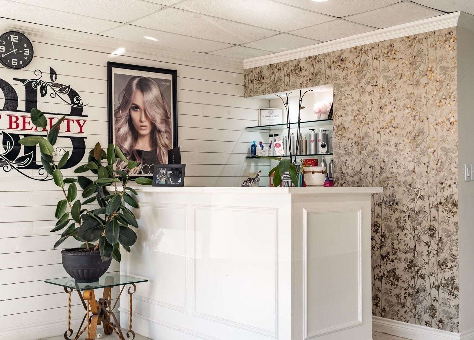 Reception area of Best Beauty Salon in Spring, Texas, US with stylish decor and beauty products displayed.