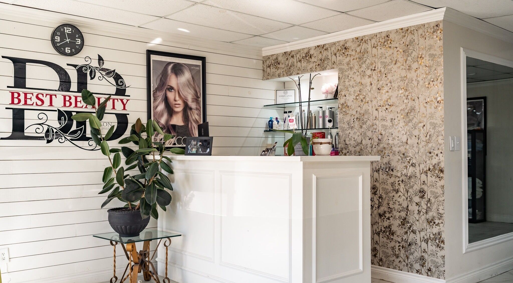 Reception area of Best Beauty Salon in Spring, Texas, US with stylish decor and beauty products displayed.