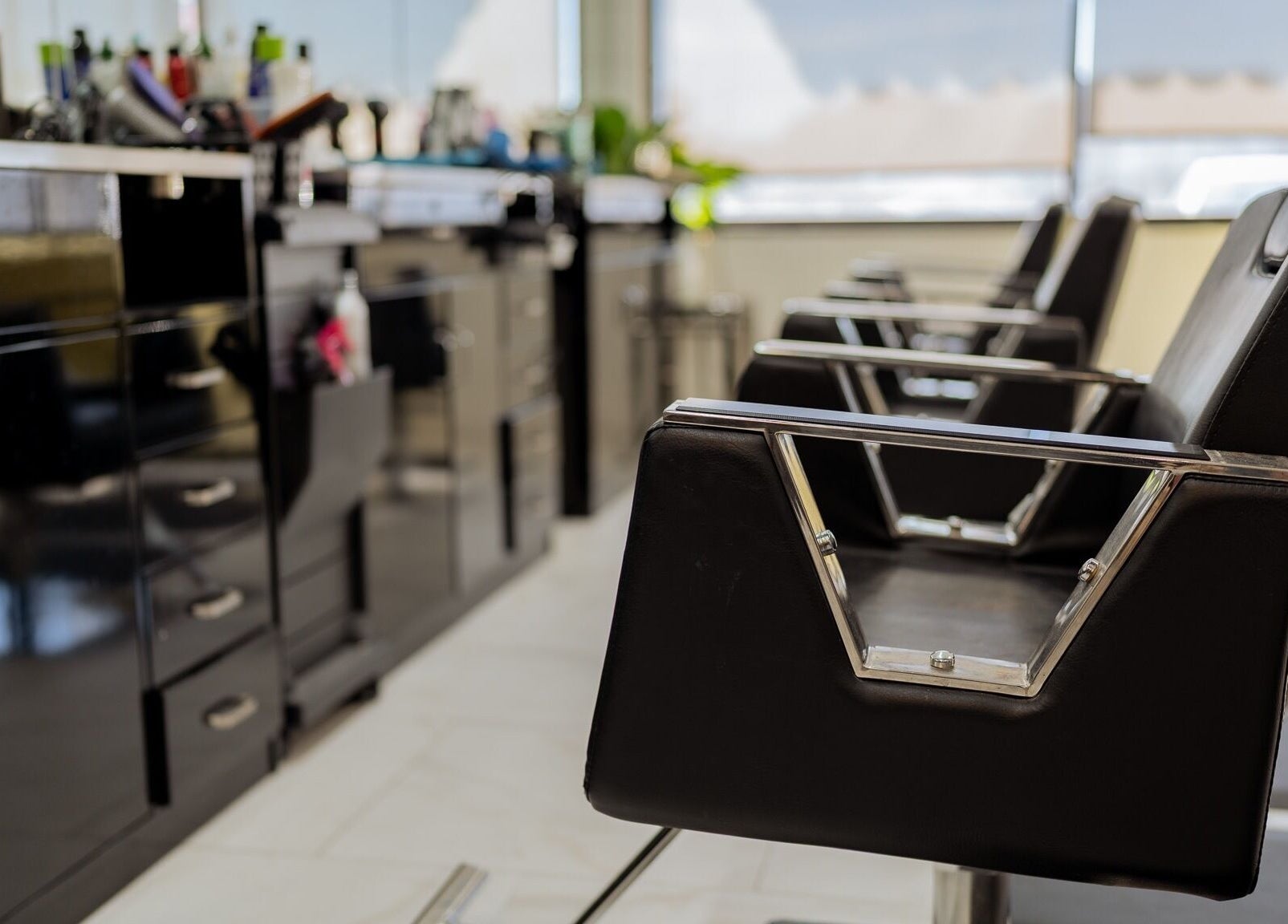 Modern styling chairs at Best Beauty Salon, Spring, Texas, US, showcasing chic and contemporary salon ambiance.
