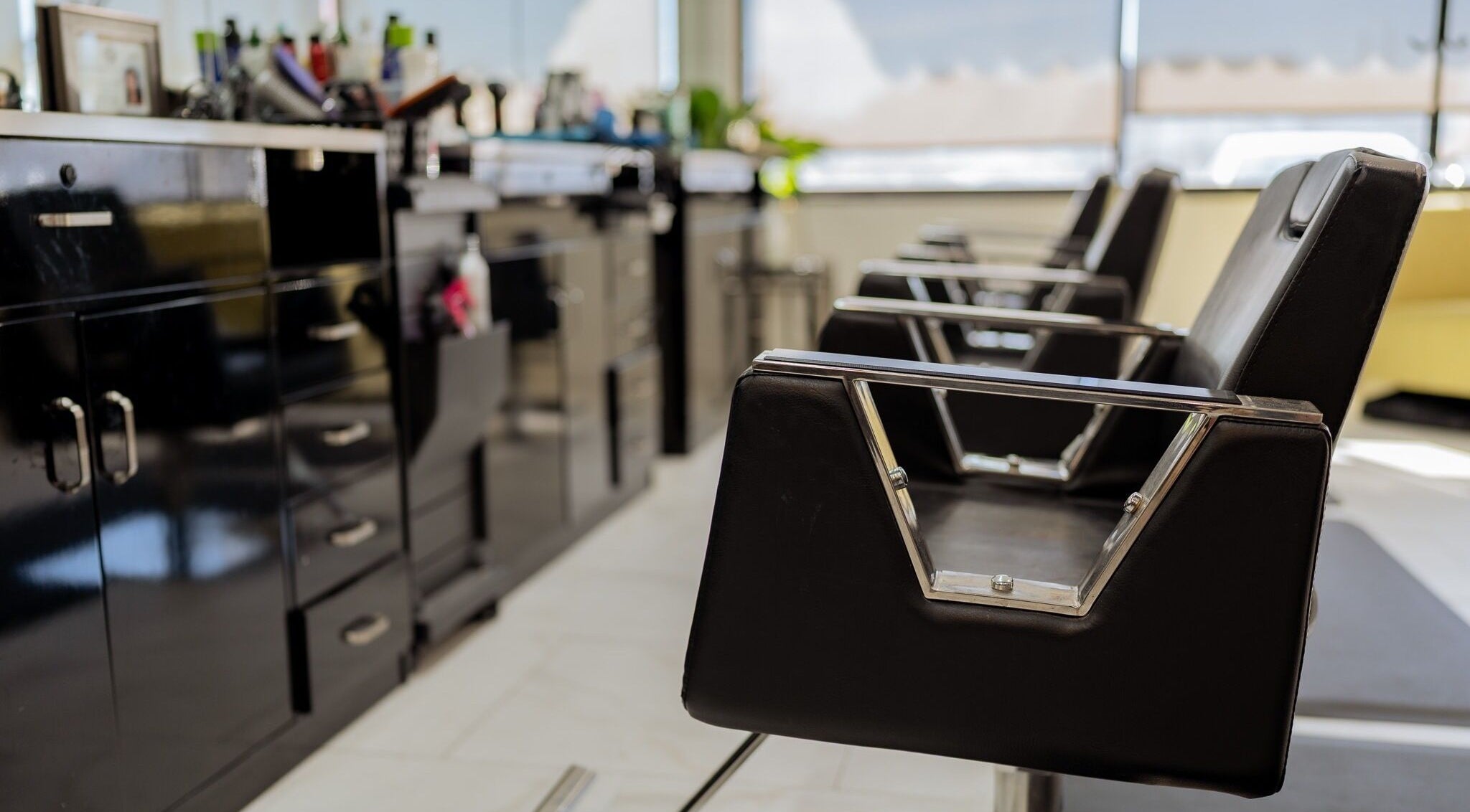 Modern styling chairs at Best Beauty Salon, Spring, Texas, US, showcasing chic and contemporary salon ambiance.