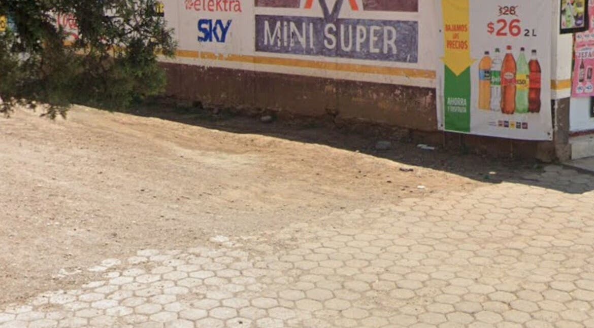 Street view near GLOW Lashes Studio, Santiago Yeche, Estado De México, MX showcasing a rustic storefront area.