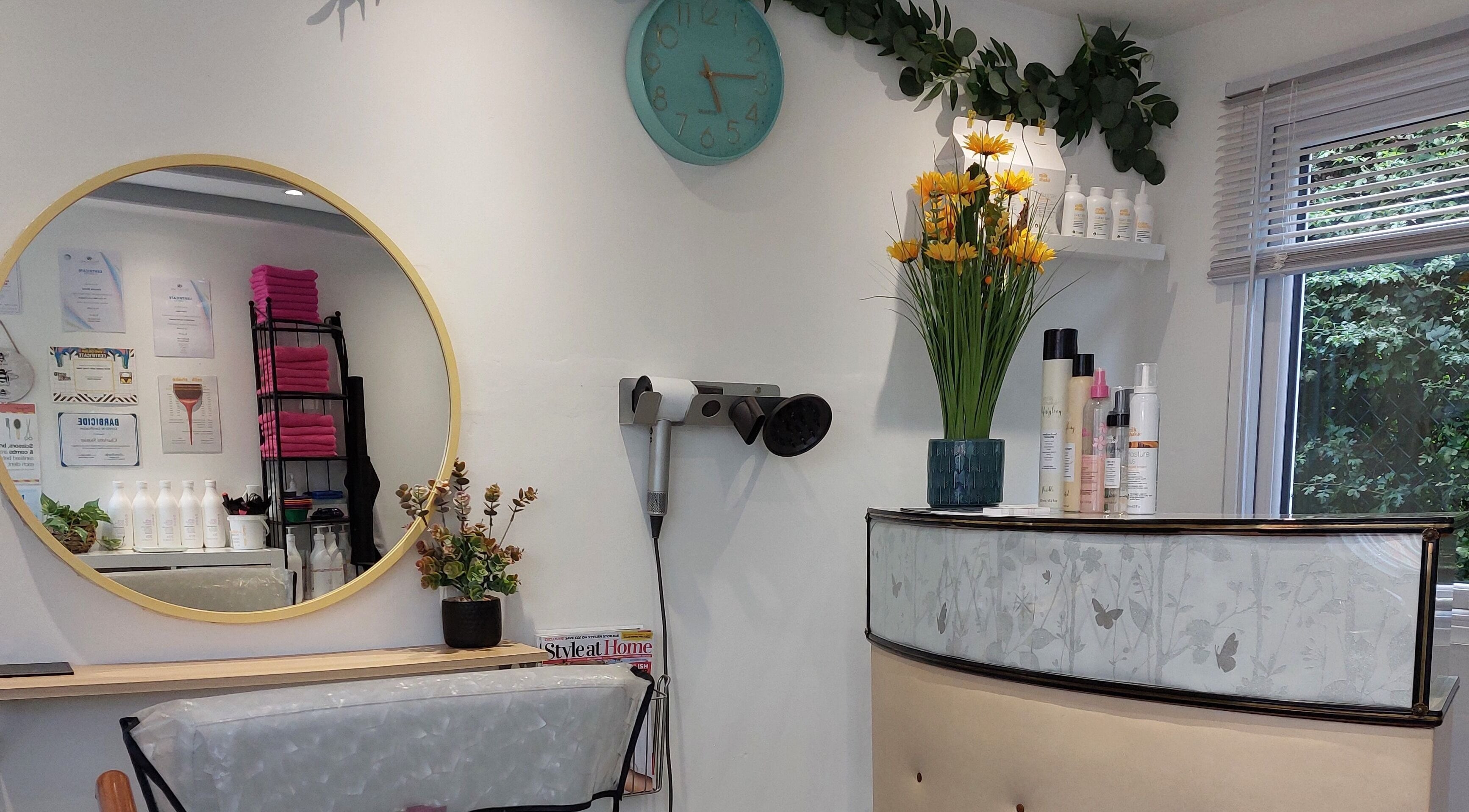 Interior of Hair by Charlotte Stonier in Leek, England featuring stylish decor and beauty products.