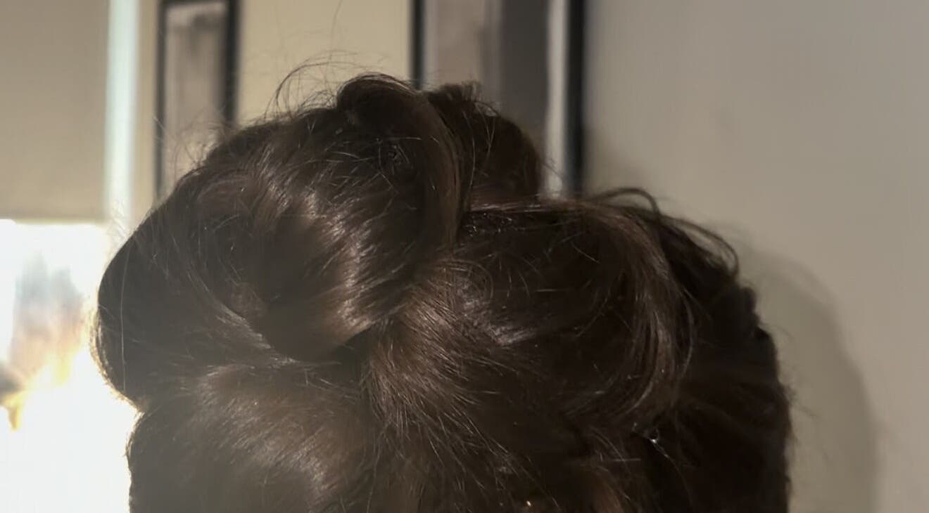 Stylish updo hairstyle at Hair by JC, located in Kilwinning, Scotland, GB.