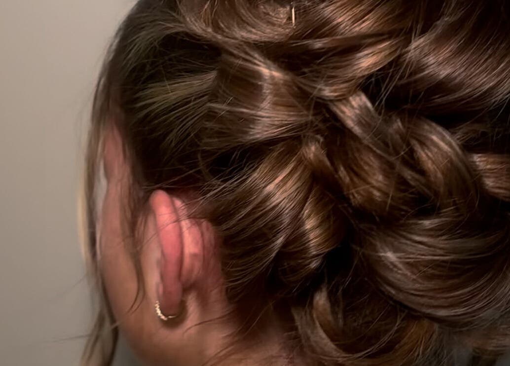 Intricate braided hairstyle at Hair by JC in Kilwinning, Scotland, GB. Ideal for special occasions.