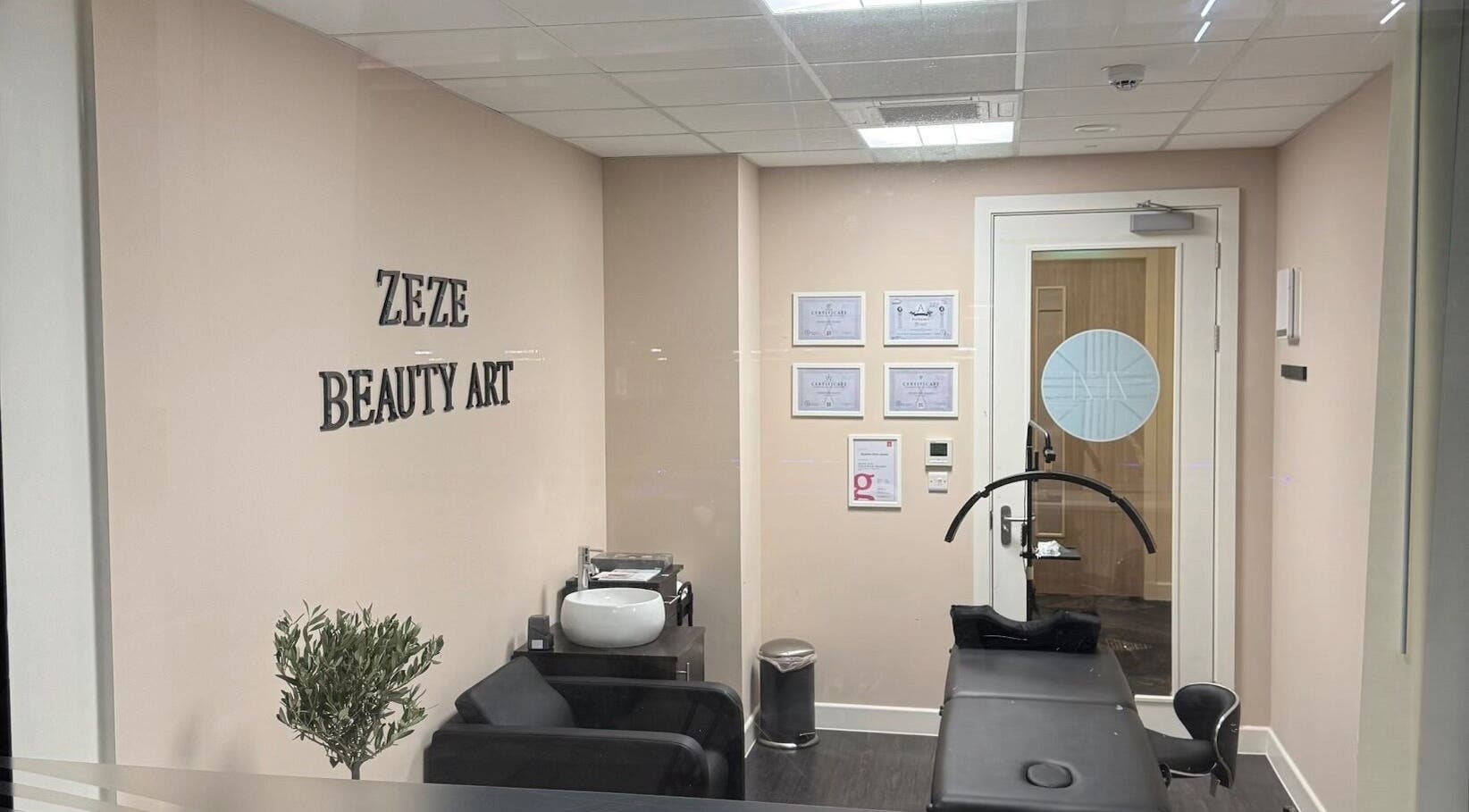 Interior of ZeZe Beauty Art salon in Birmingham, England, GB showcasing sleek design and modern equipment.