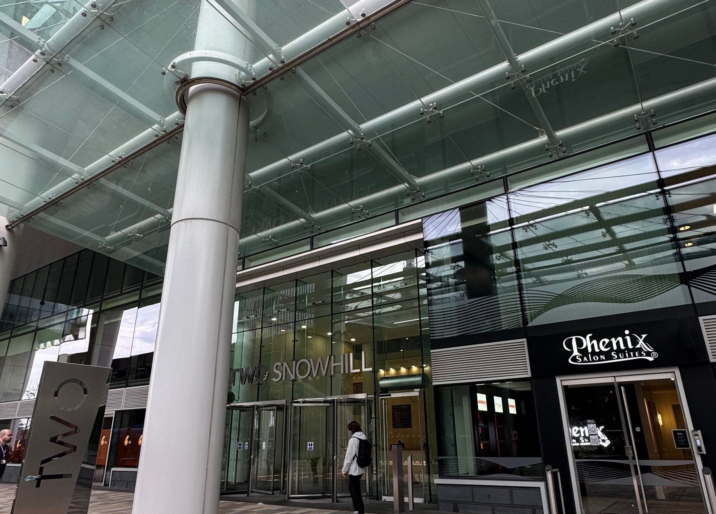 Entrance of ZeZe Beauty Art at Two Snowhill in Birmingham, England, GB with sleek glass architecture.