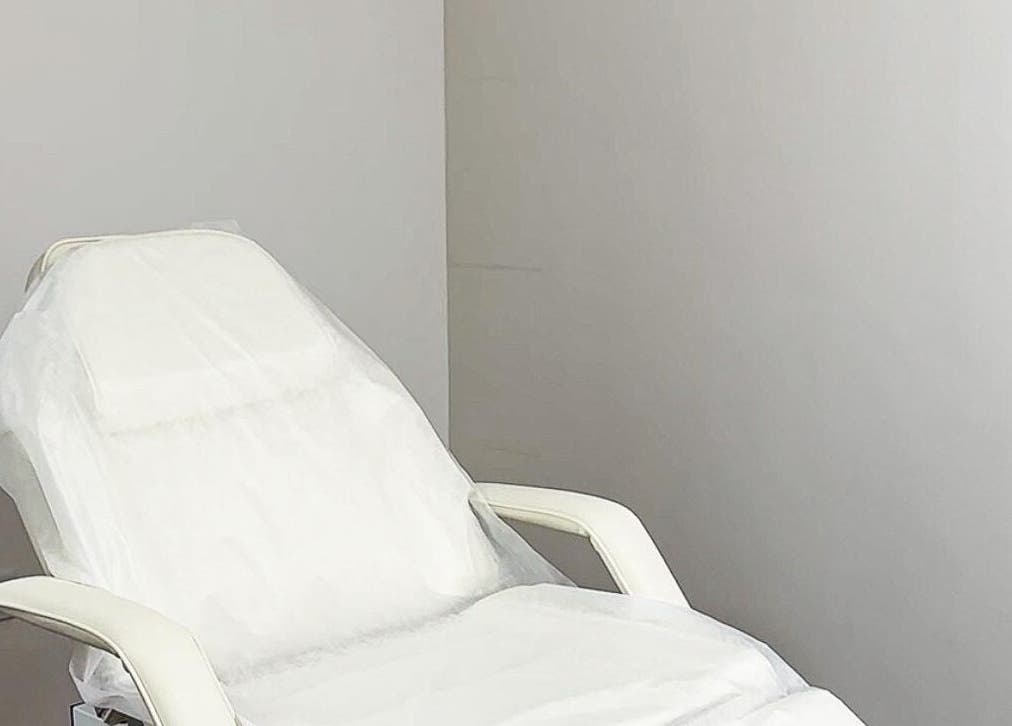 A serene treatment chair at Elya Aesthetic in London, England, GB, perfect for wellness experiences.