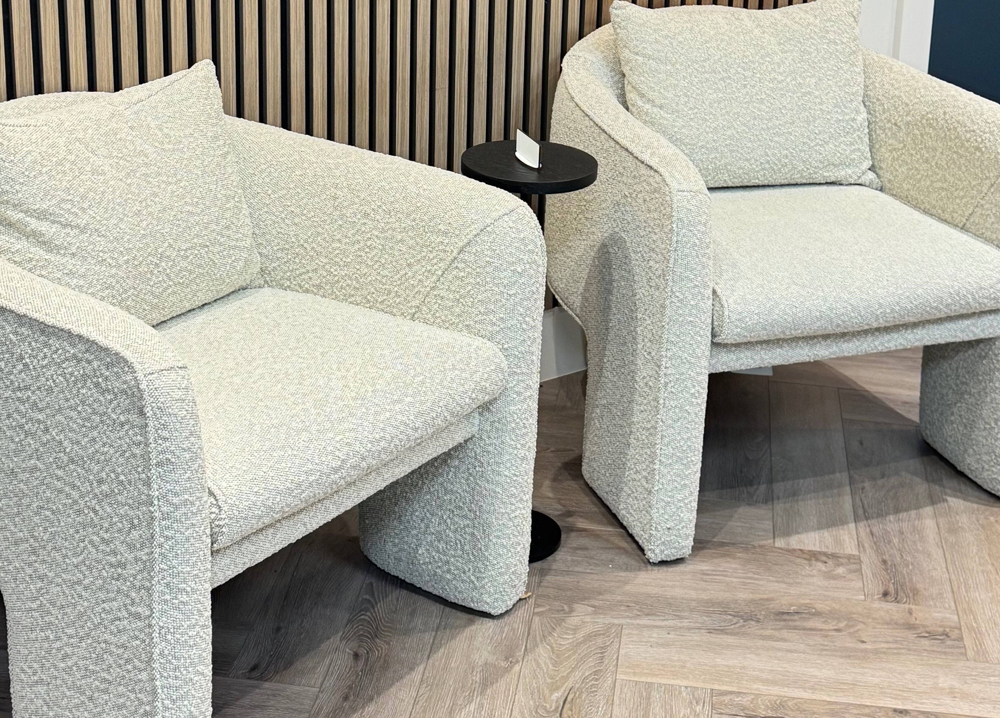 Elegant seating area at Elya Aesthetic, London, England, GB showcasing plush modern chairs.