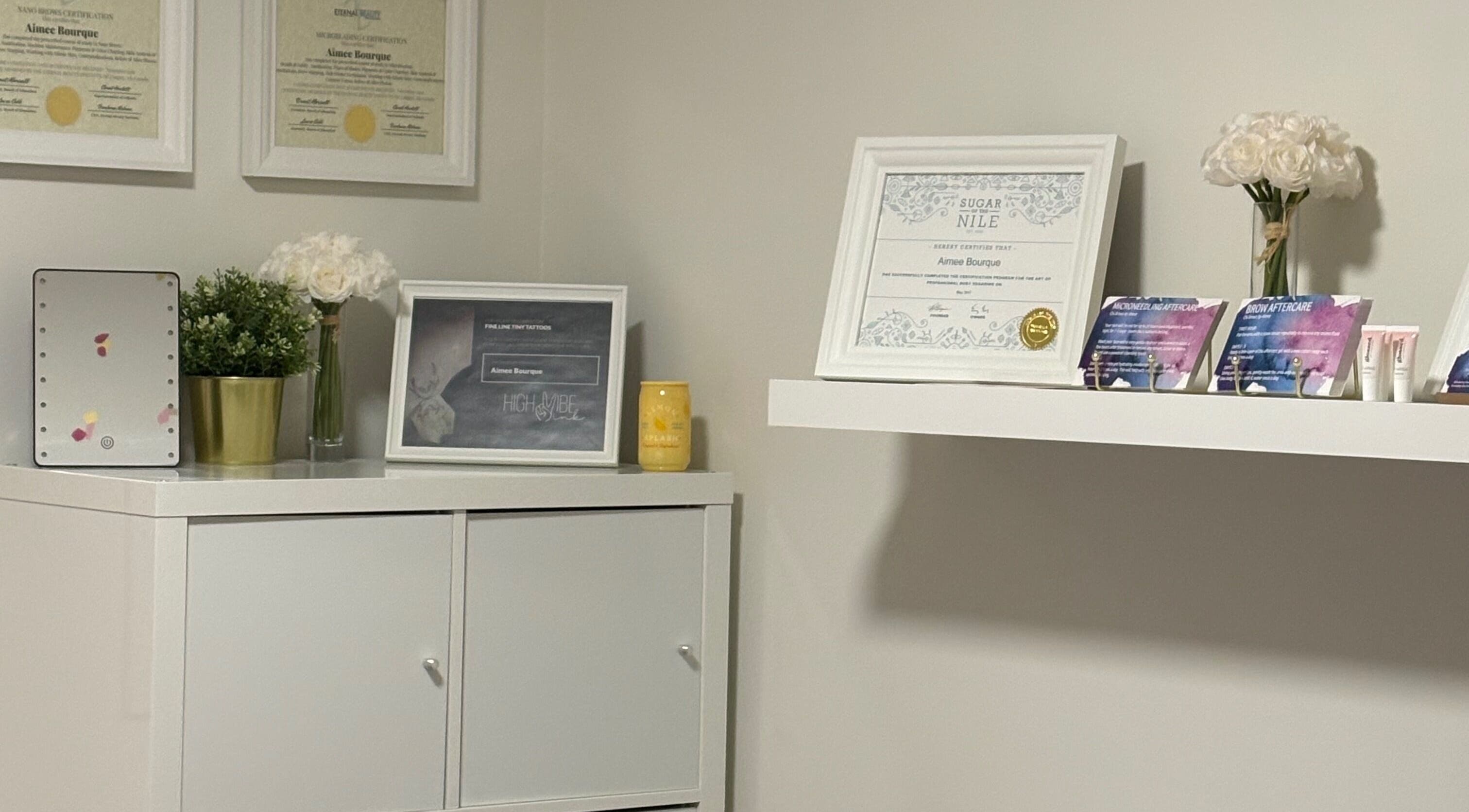 Chi Beauty by Aimee showcases certifications and decor in Calgary, Alberta, CA for a refined ambiance.