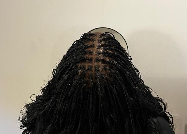 Intricate braids at Hairdressers of the North, Roodepoort, Gauteng, ZA.