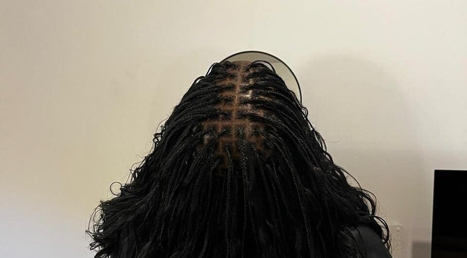 Intricate braids at Hairdressers of the North, Roodepoort, Gauteng, ZA.