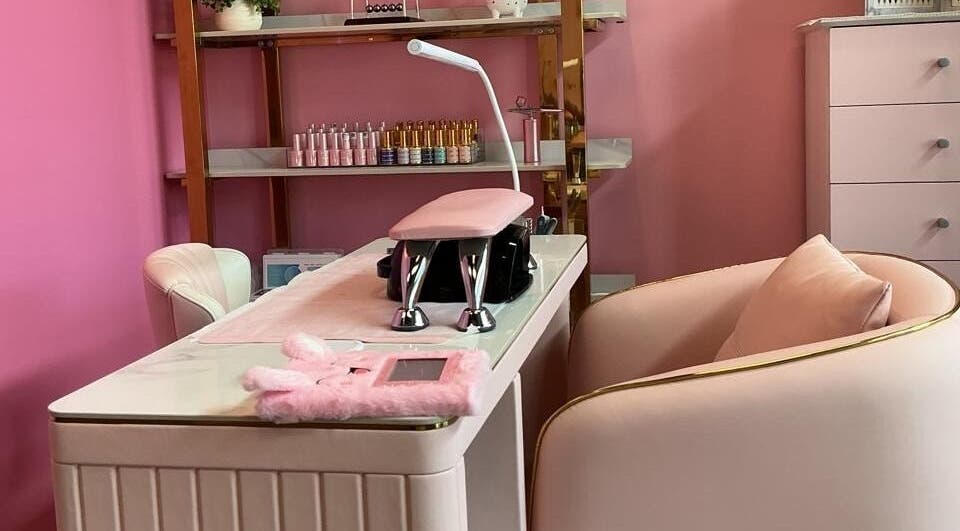 Luxurious nail station at City Nails & Beauty Studio, Christchurch, Canterbury Region, NZ, with plush pink decor.