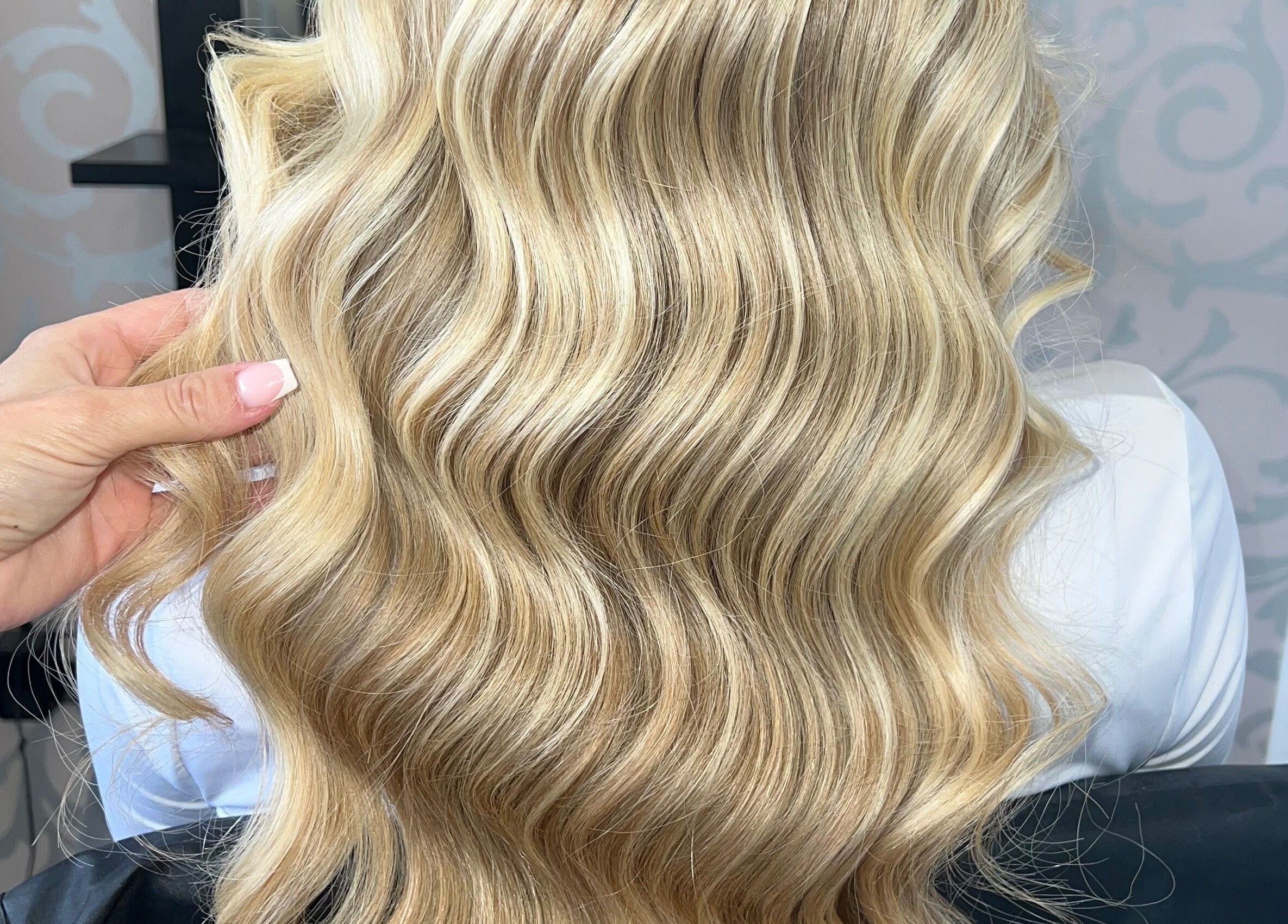 Elegant blonde waves styled at Bylivbeevor, Hatfield, England, GB.