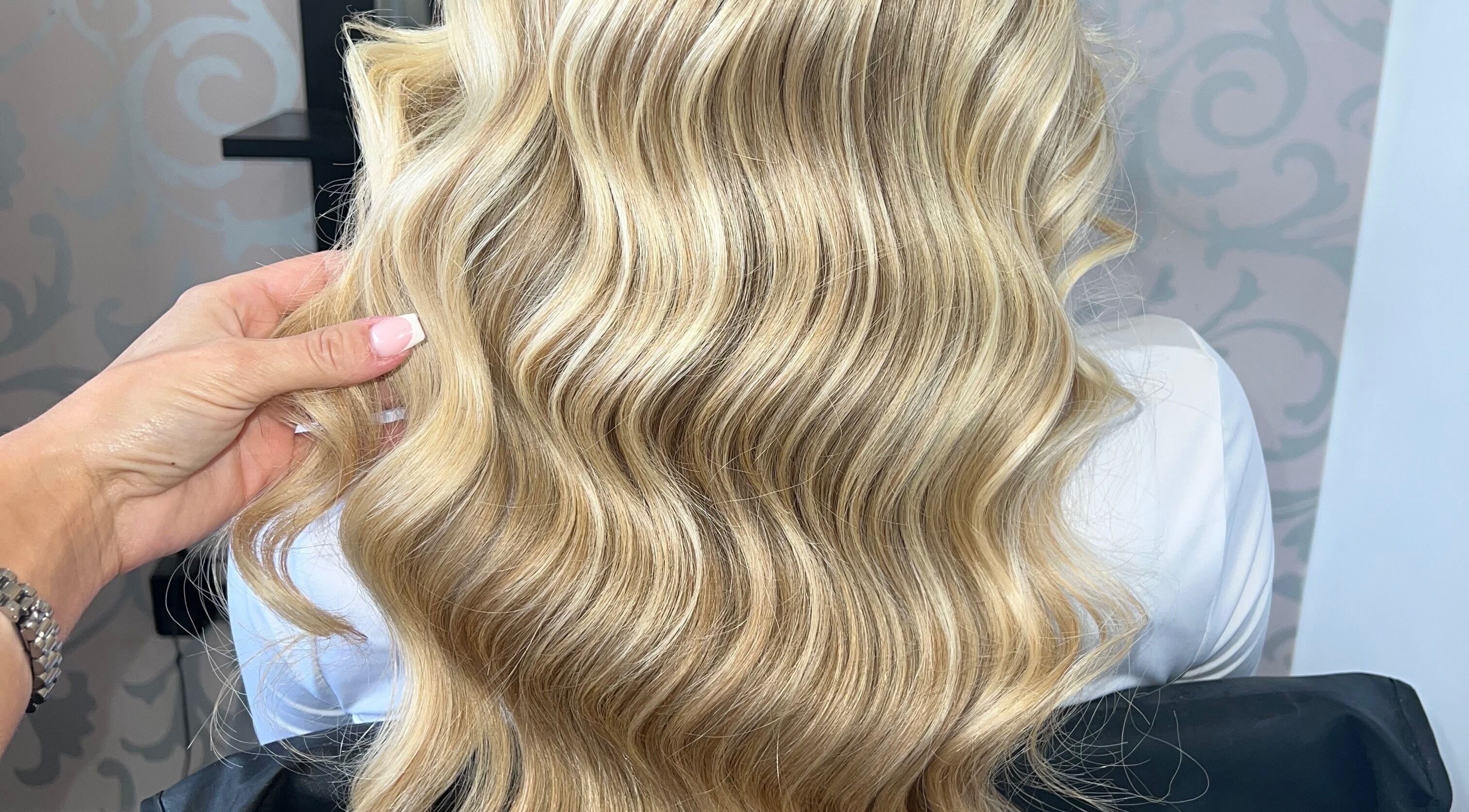 Elegant blonde waves styled at Bylivbeevor, Hatfield, England, GB.