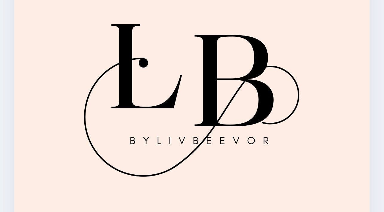 Bylivbeevor logo with stylized initials on a soft peach background, Hatfield, England, GB.