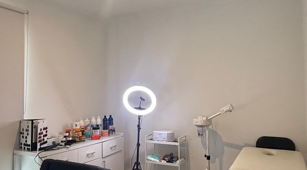 Interior of Strand & Style Beauty Lounge in Melbourne, Victoria, AU showcasing a serene treatment room.