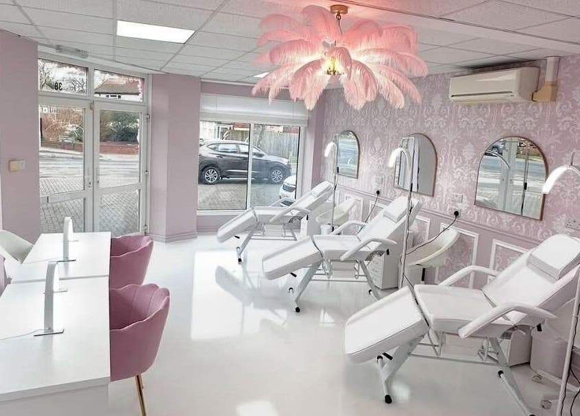 Elegant beauty salon at casiejeanlashes, Birmingham, England, GB with chic decor and reclining chairs.