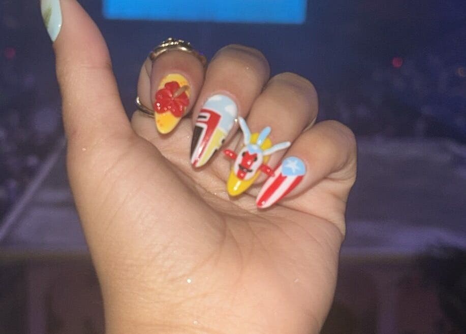 Colorful nail art design by Beautybarbygeopr in Vega Alta, PR, showcasing intricate artistic patterns.