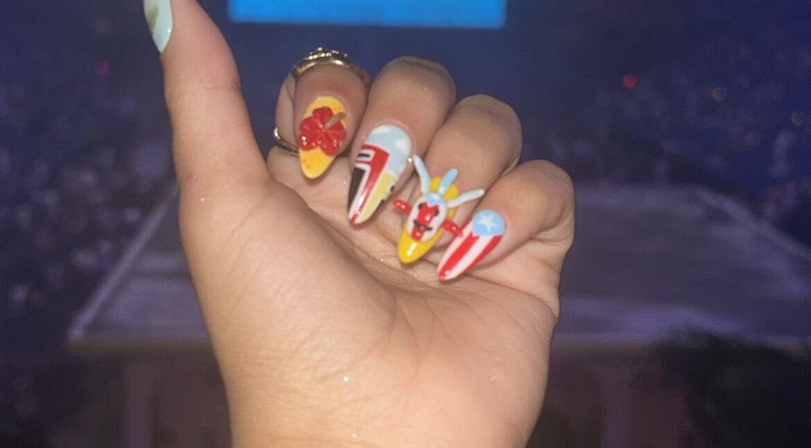 Colorful nail art design by Beautybarbygeopr in Vega Alta, PR, showcasing intricate artistic patterns.