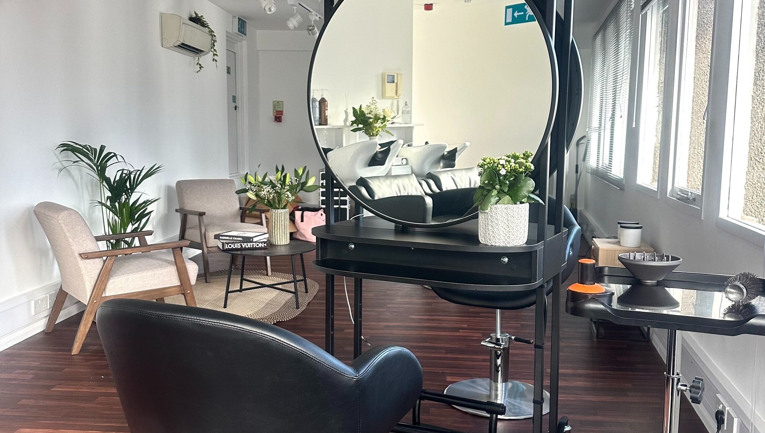 Elegant interior of Zoey Olechnowicz Hair Colourist in London, England, GB featuring stylish chairs and modern decor.