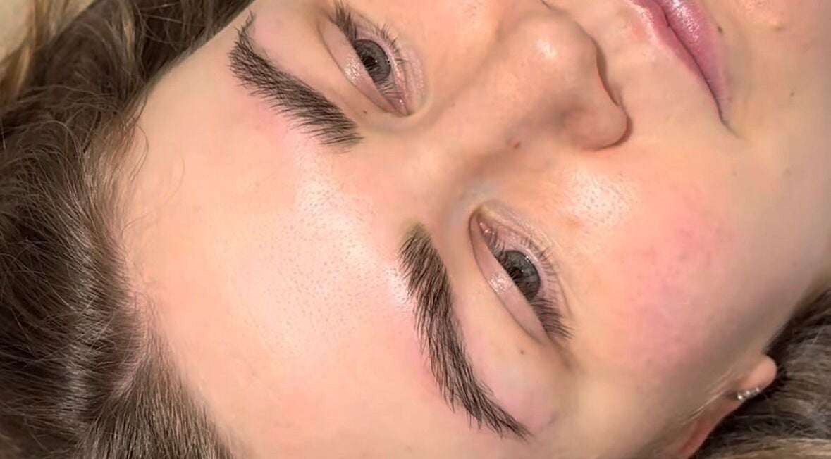 Close-up of a woman’s relaxed face with groomed eyebrows at Doe of the Dales, Alfreton, England, GB.