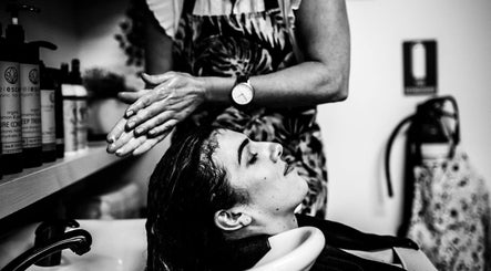 A serene hair washing session at Curly & Co Hair in Tweed Heads, New South Wales, AU.
