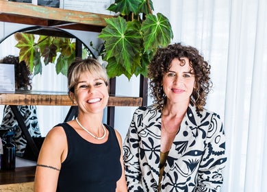 Stylists at Curly & Co Hair, Tweed Heads, New South Wales, AU, showcasing welcoming atmosphere.