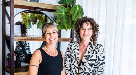 Stylists at Curly & Co Hair, Tweed Heads, New South Wales, AU, showcasing welcoming atmosphere.