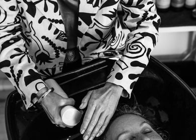 Hair wash at Curly & Co Hair in Tweed Heads, New South Wales, AU. Stylish service with artistic flair.