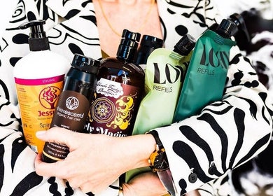 Diverse hair products at Curly & Co Hair, Tweed Heads, NSW, AU, ideal for enhancing curls and hair care.