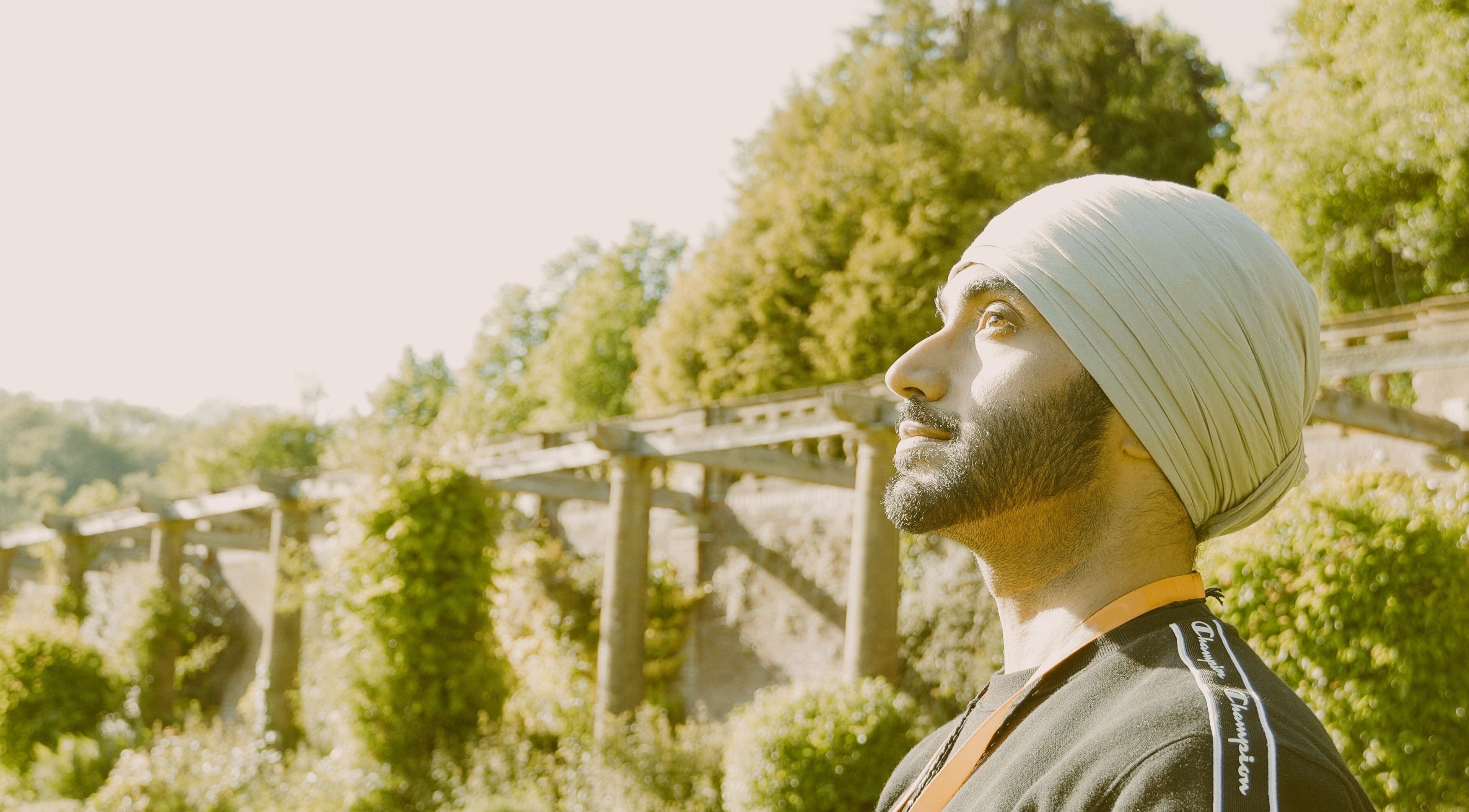 Person reflecting amid nature at Seek Within, Walsall, England, GB, showcasing tranquility and mindfulness.