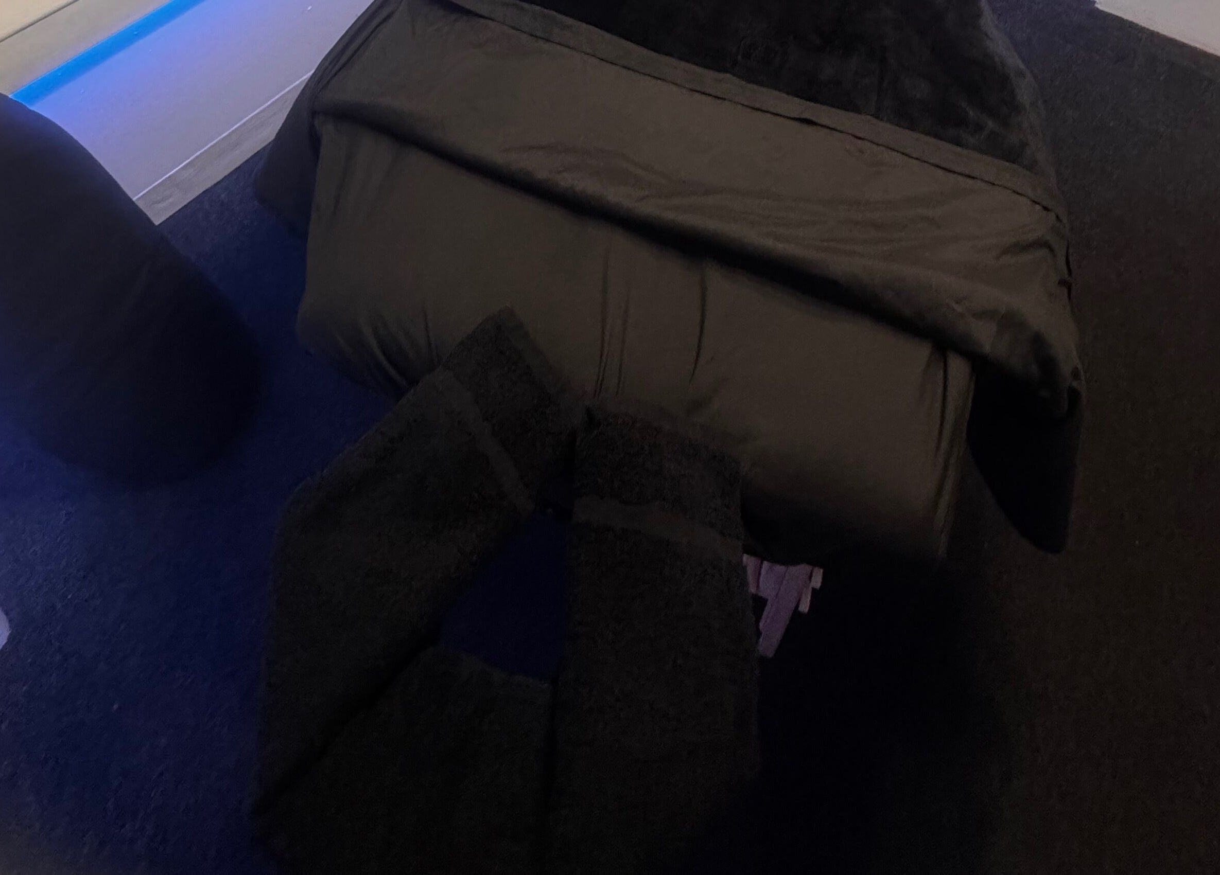 Cozy massage table at Harmony Hands Derby, England, GB, offering serene wellness experiences.