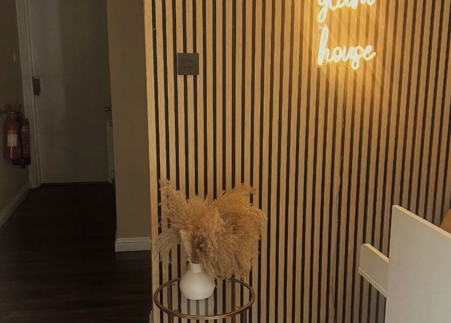 Elegant entrance at Hair by Casey in Edinburgh, Scotland, GB with stylish decor and ambient lighting.